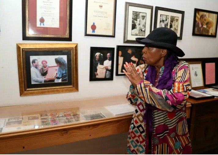 Inside the Professor Mazisi Kunene Museum, Glenwood: framed honours and photographs